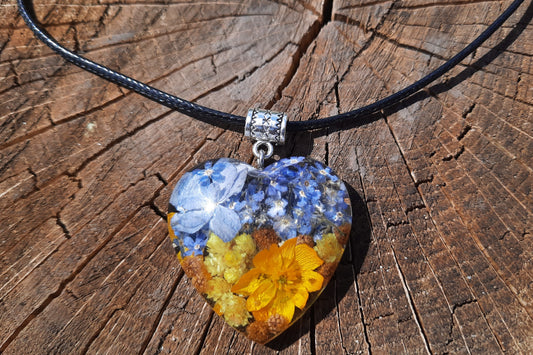 Ukrainian patriotic pendant with flowers in jewelry resin
