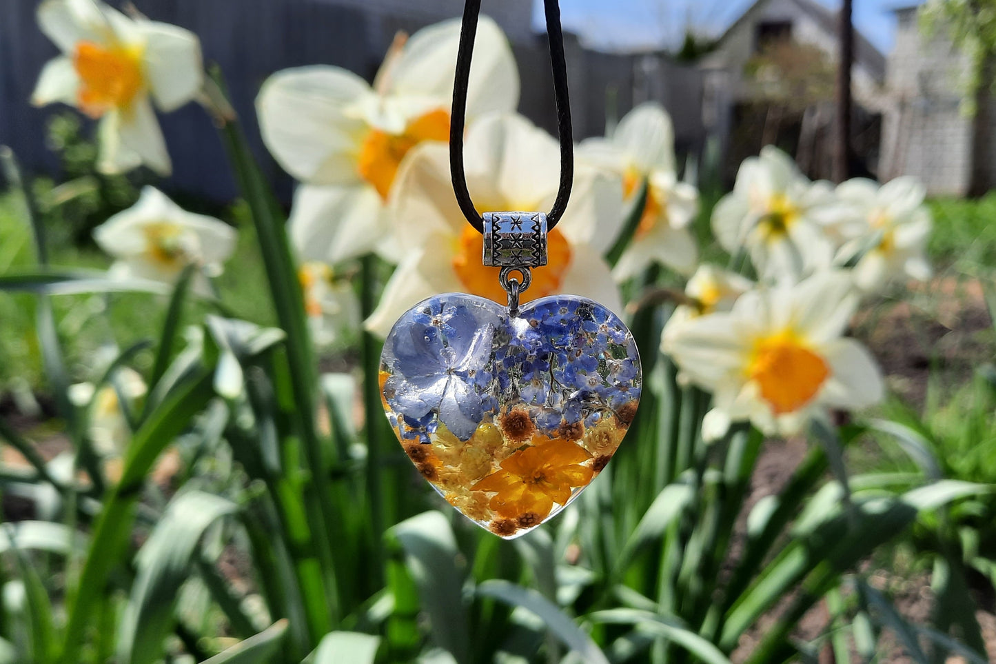 Ukrainian patriotic pendant with flowers in jewelry resin