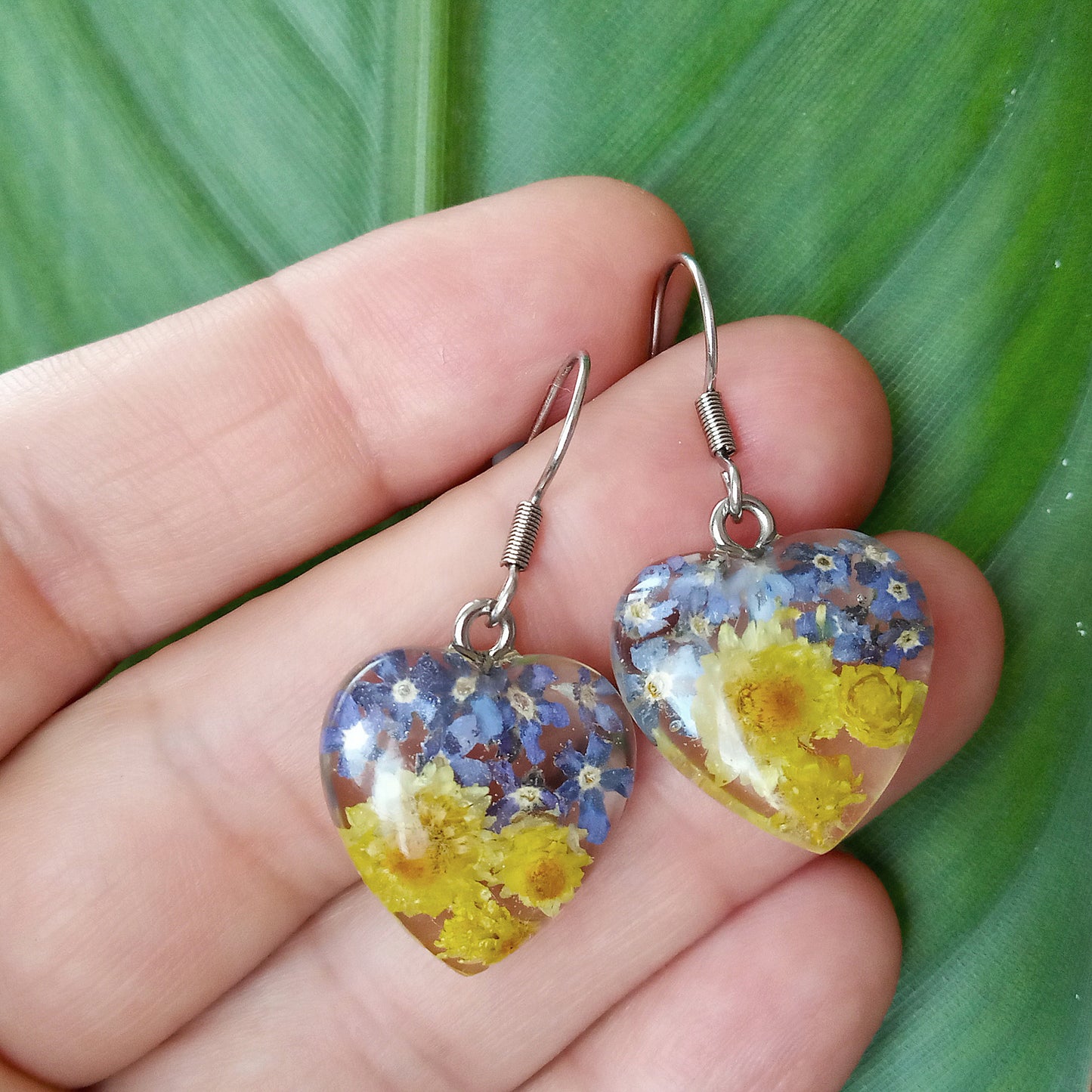 Ukrainian patriotic earrings with flowers in jewelry resin