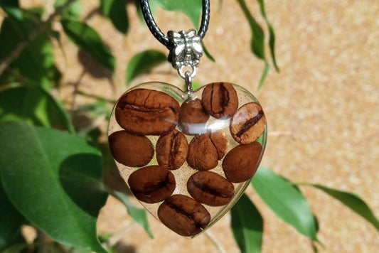 Pendant with coffee beans in epoxy resin.